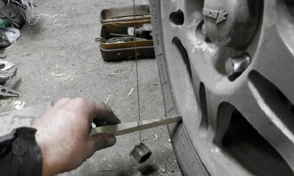 Замер расстояния от обода до отвеса